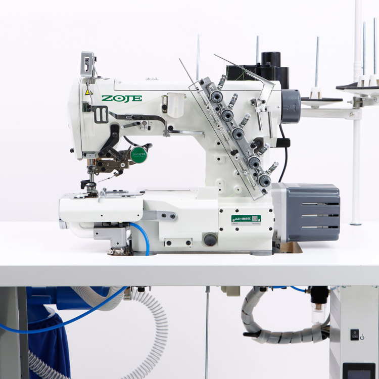 3-needle cylinder bed coverstitch (interlock) machine with left knife, electromagnetic automatic thread trimmer and built-in AC Servo motor - SET